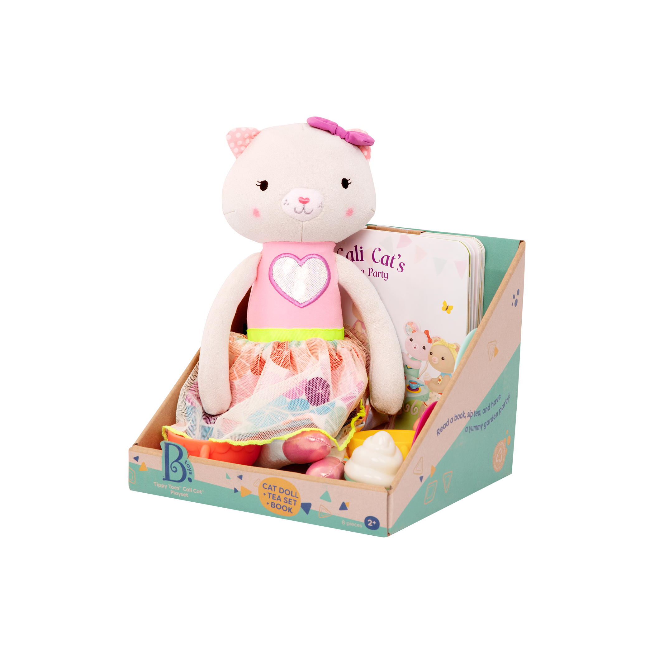 Tea set with plush cat and book.