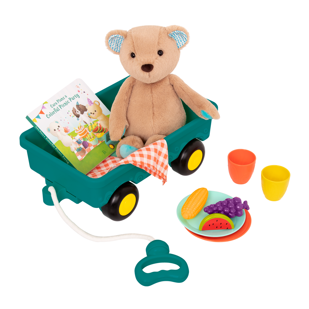 Plush bear with picnic playset and book.