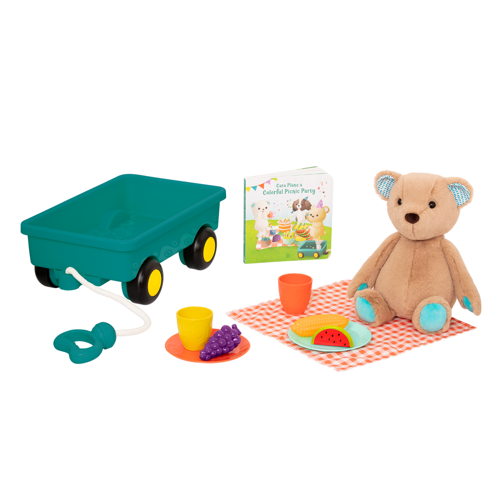 Plush bear with picnic playset and book.