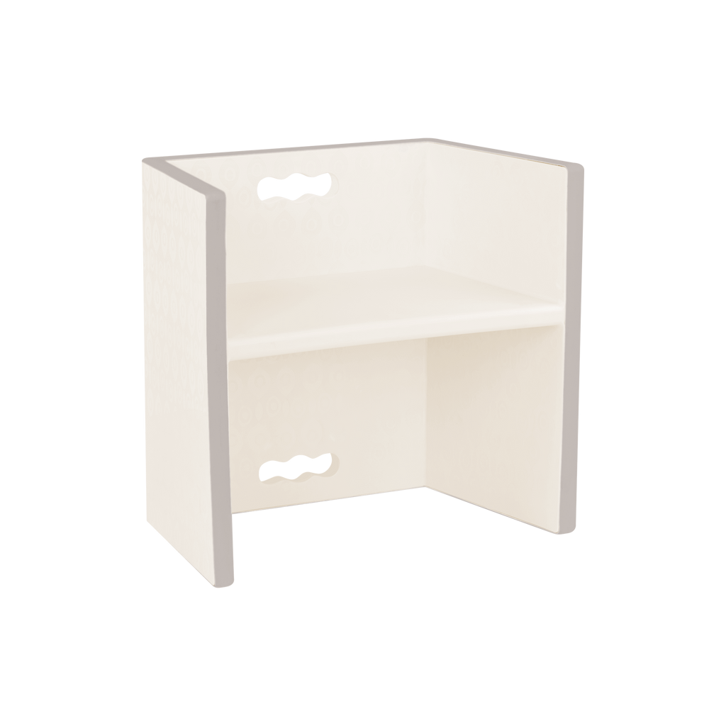 Ivory chair doubles as step stool.