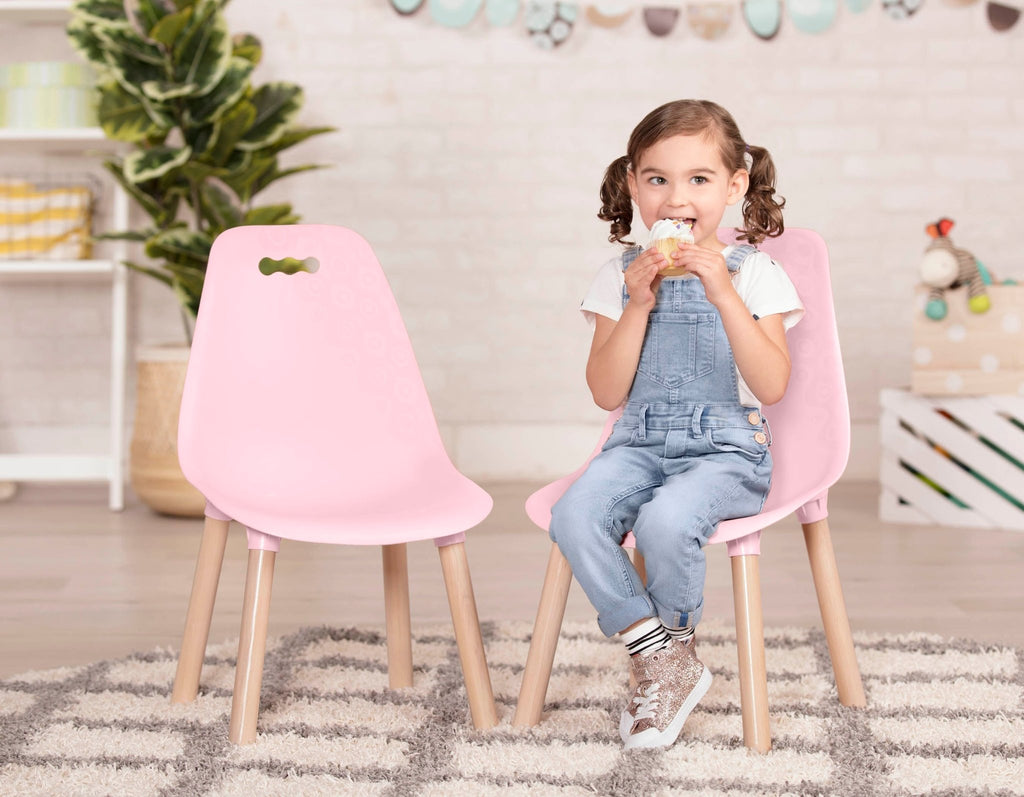 Two pink chairs for kids.