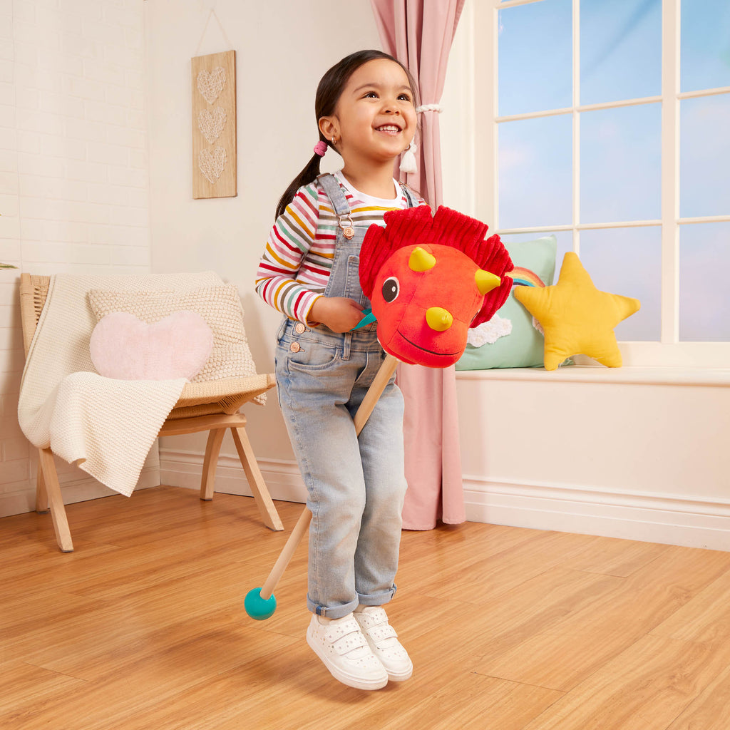 Plush dino hobbyhorse triceratops with wooden stick, sounds, and sensory textures