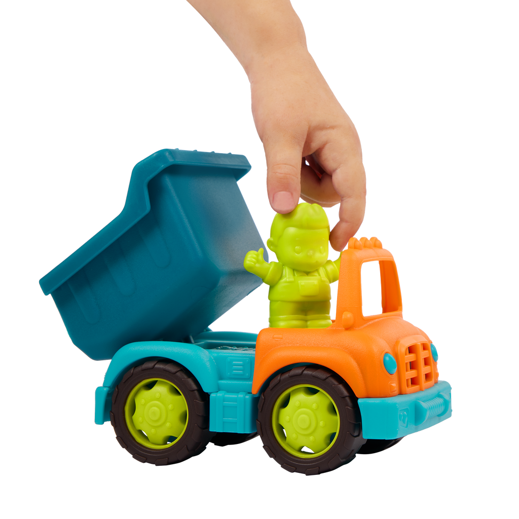 Toy dump trucks with sand molds