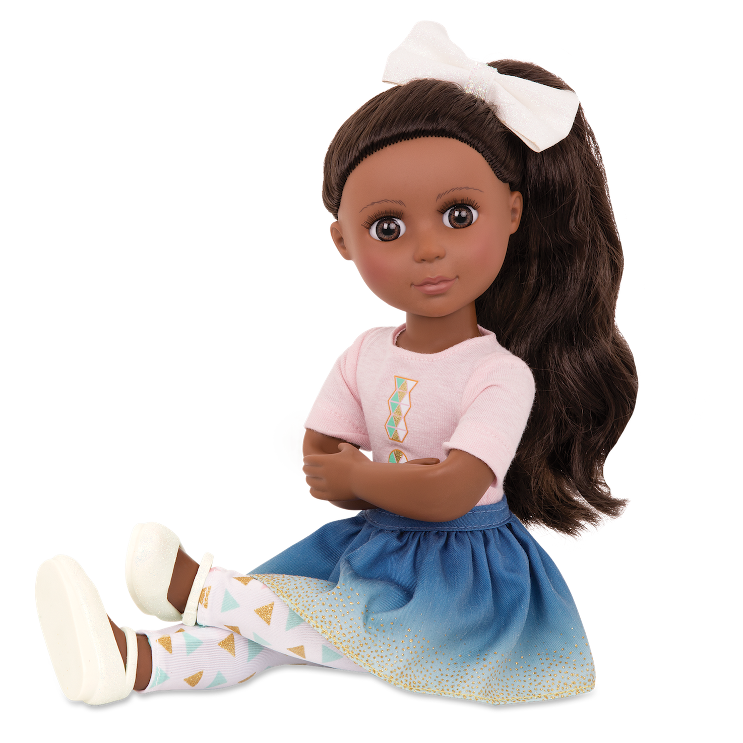 14-inch posable doll with dark brown hair and brown eyes