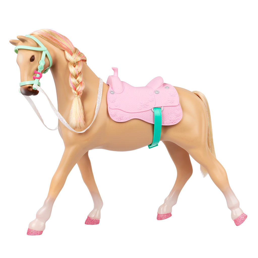 14-inch posable doll with brown hair and blue eyes next to toy horse
