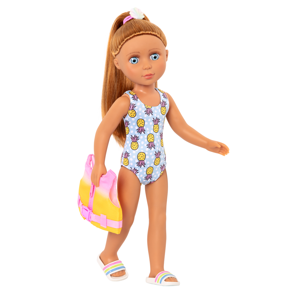 14-inch posable doll with light brown hair and blue eyes holding paddleboard