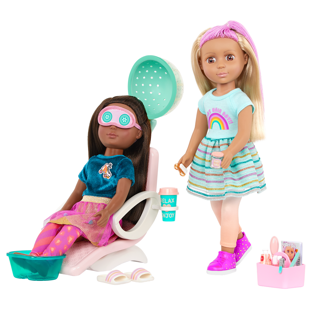 Two 14-inch dolls with salon chair and spa accessories