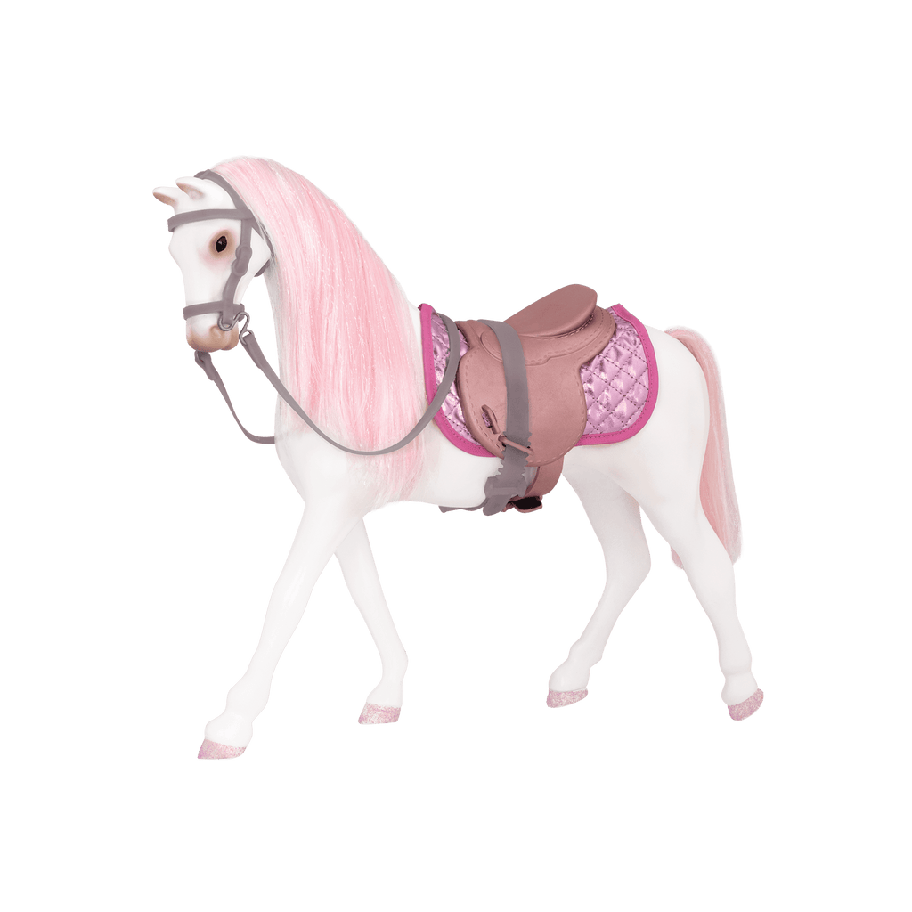 White and pink toy horse with saddle