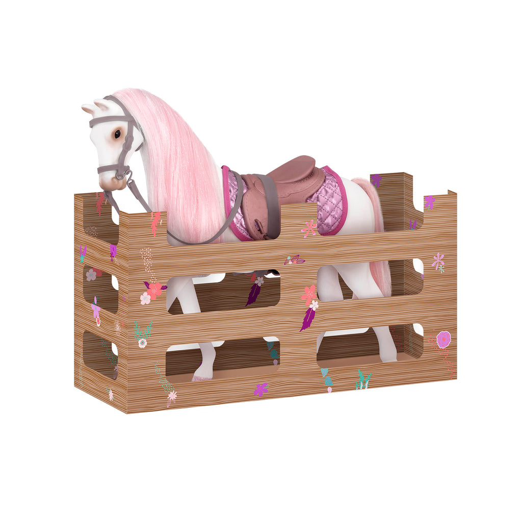 White and pink toy horse with saddle