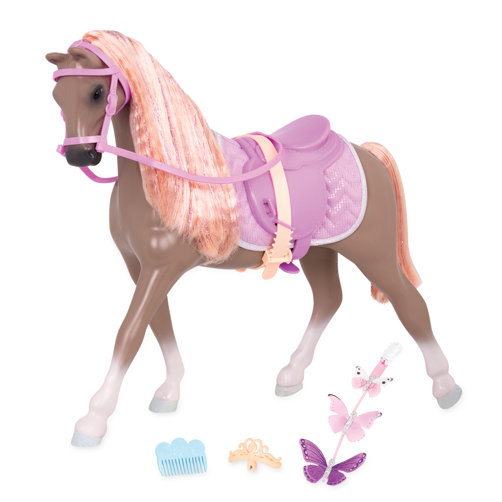 Light brown and peach horse with saddle and accessories