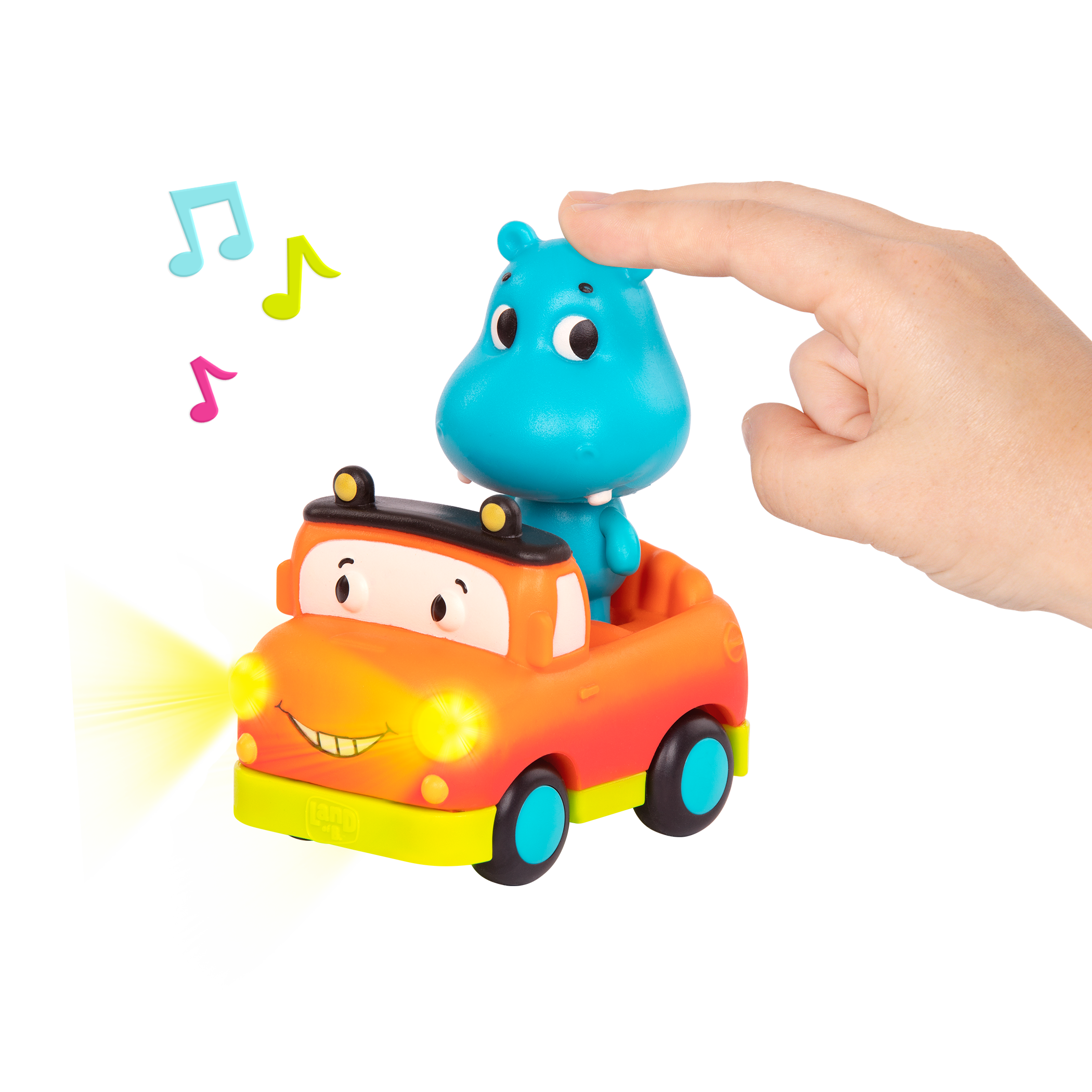 Light-up toy hippo in pickup truck