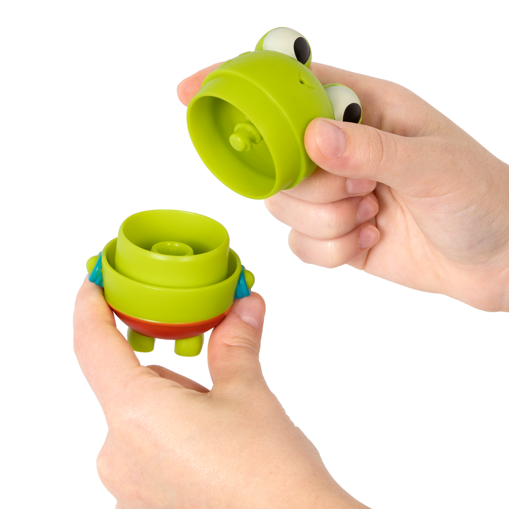 Frog squirt and light-up whale bath toys.