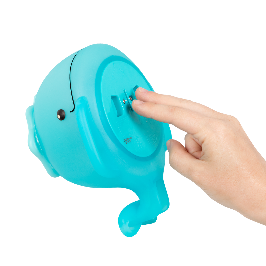 Frog squirt and light-up whale bath toys.