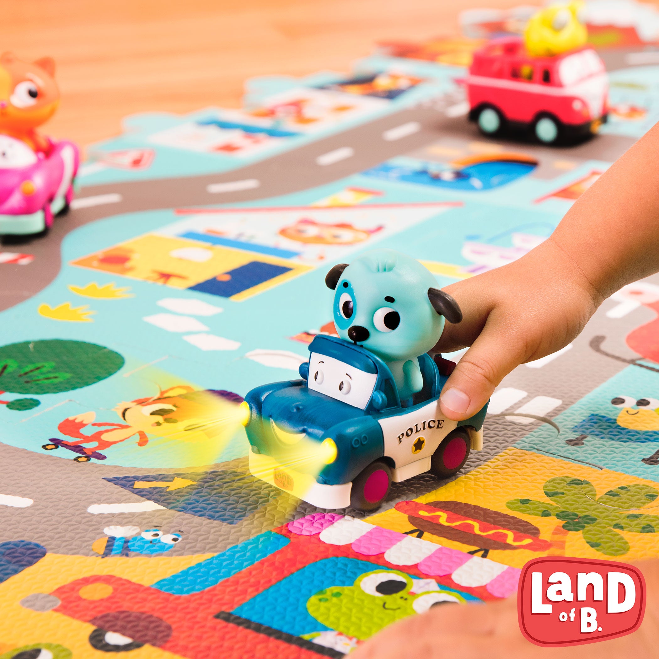 Light-up toy dog and police car