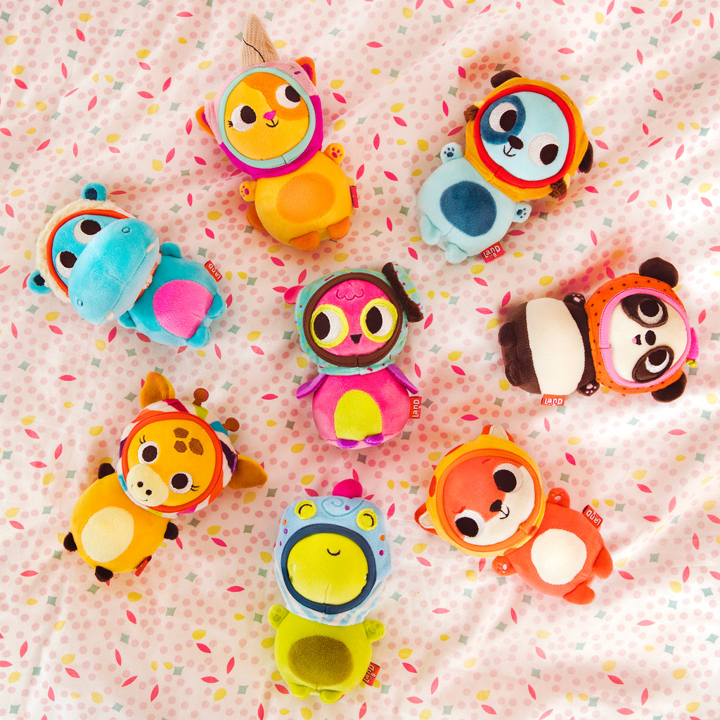 Plush fox with a pizza hood.