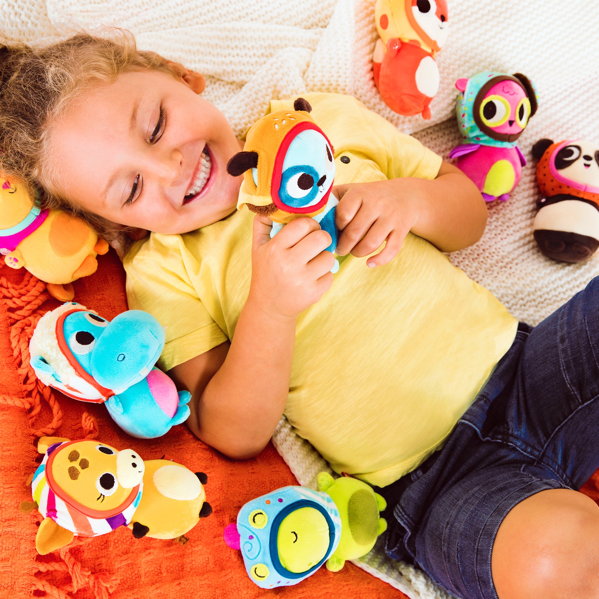 Plush frog with a cupcake hood.