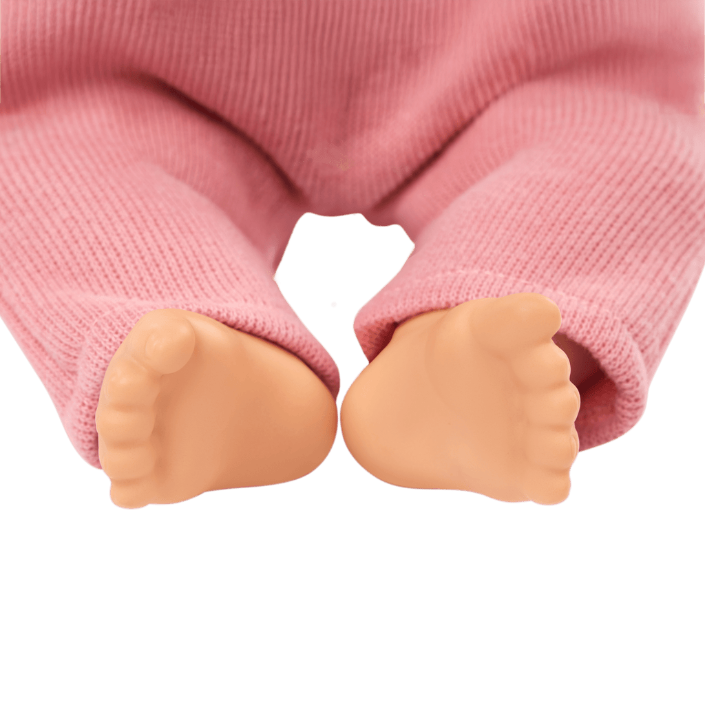 LullaBaby doll in pink romper