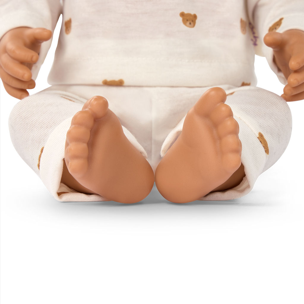 LullaBaby boy doll with brown hair in teddy bear outfit