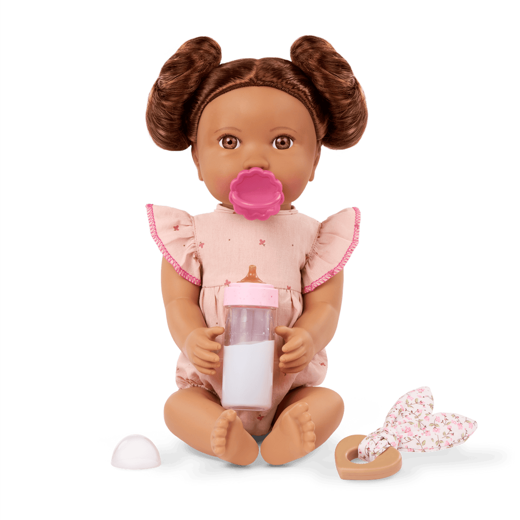 LullaBaby doll with brown hair in pink outfit