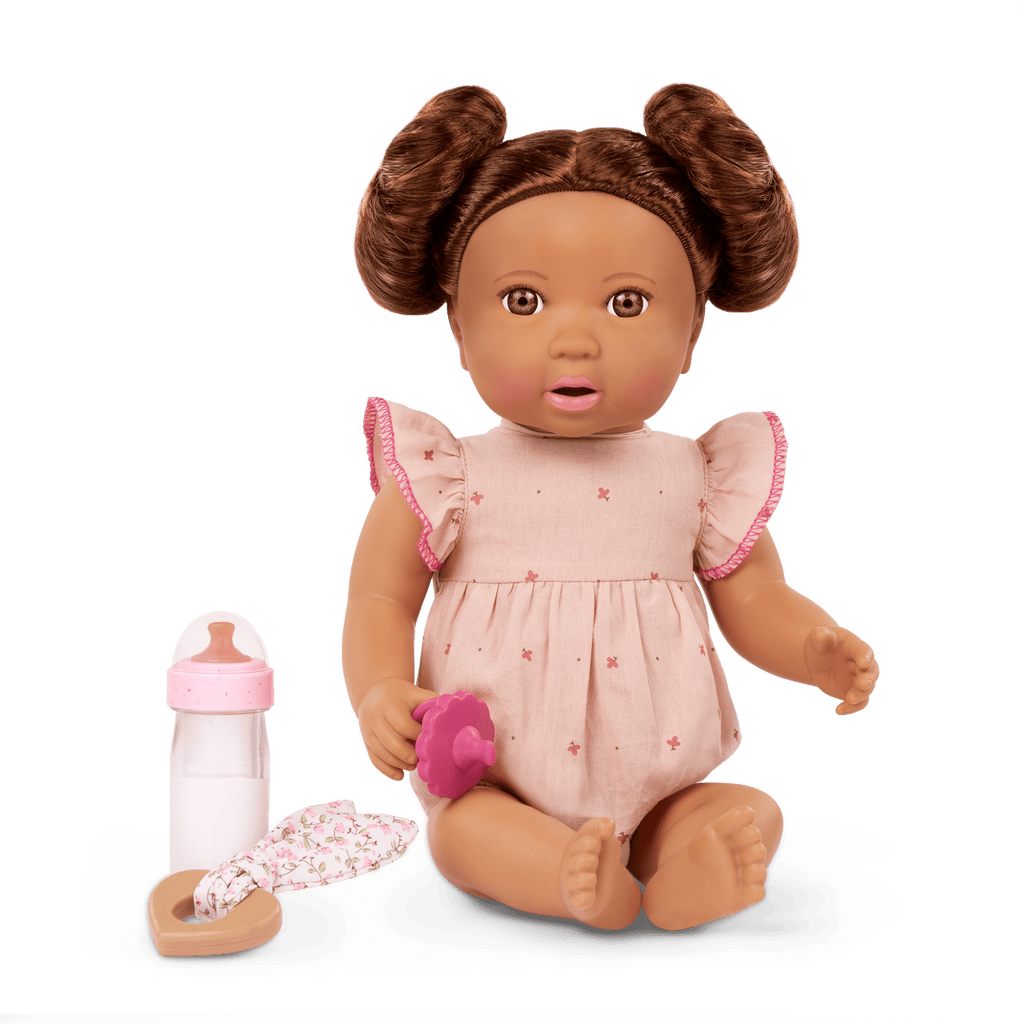 LullaBaby doll with brown hair in pink outfit