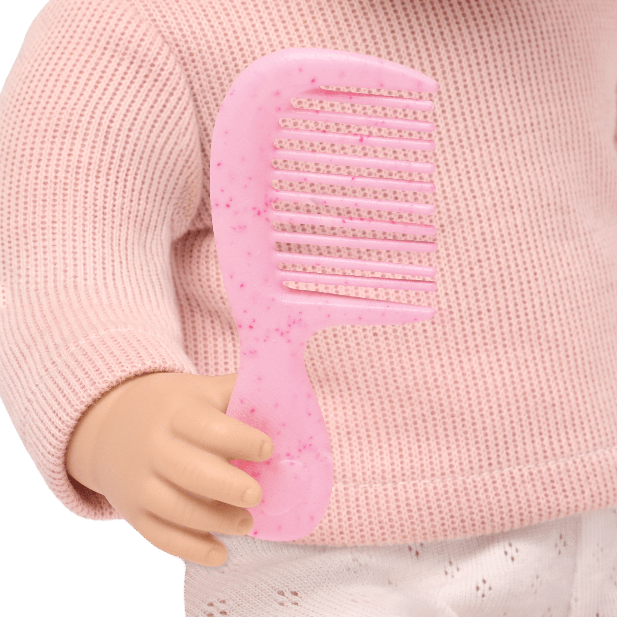 LullaBaby doll with blonde hair and pink comb