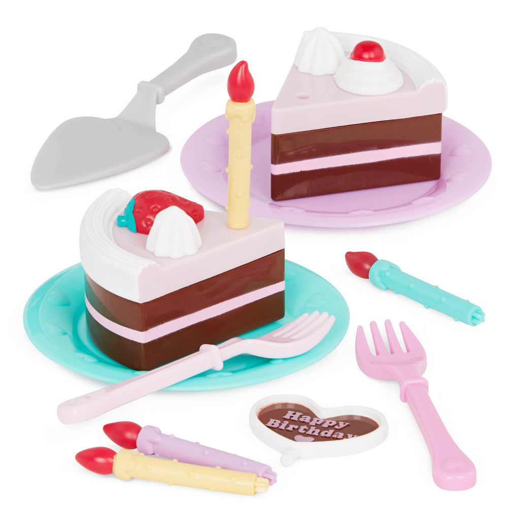 2 slices of pretend birthday cake with candles and utensils.