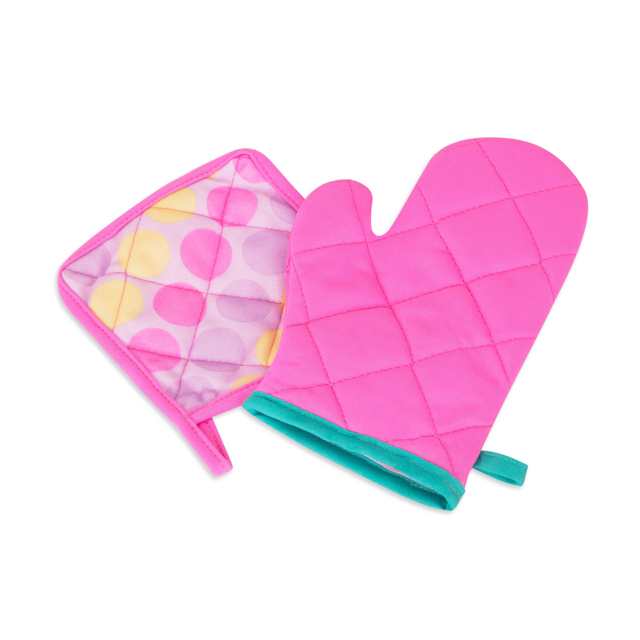 A pink apron set for kids with a chef's hat, oven mitt, and more.IThe Smart Cookie Chef's Apron in a realistc setting, there is an apron, chef's hat, oven mitt, cooking utensils and pot holder.