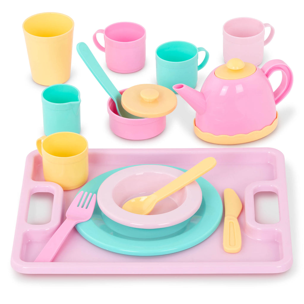A set of toy dishes including a tea pot.