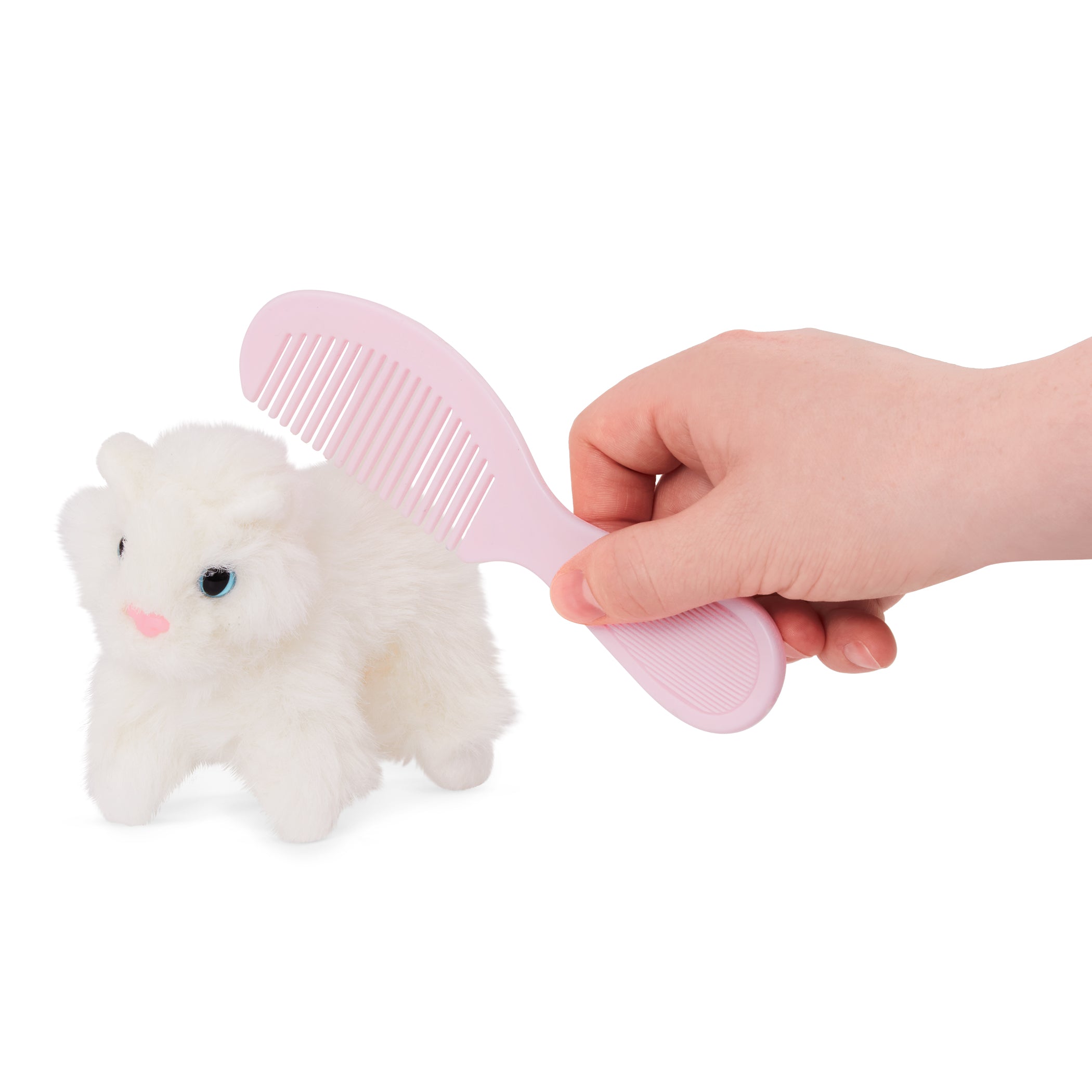 A cuteplush kitten in a pink carrying case for toddlers and kids.