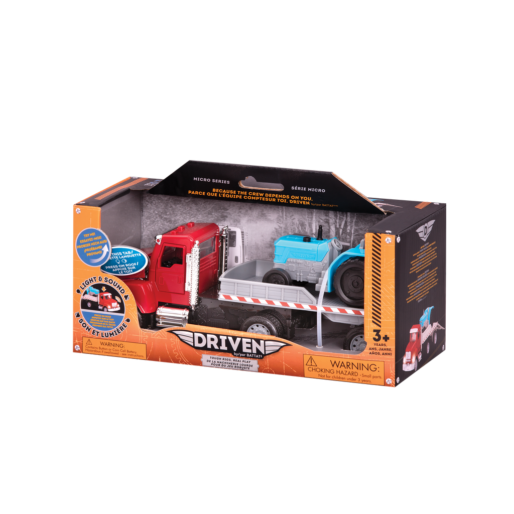 Red toy flatbed truck carrying blue tractor