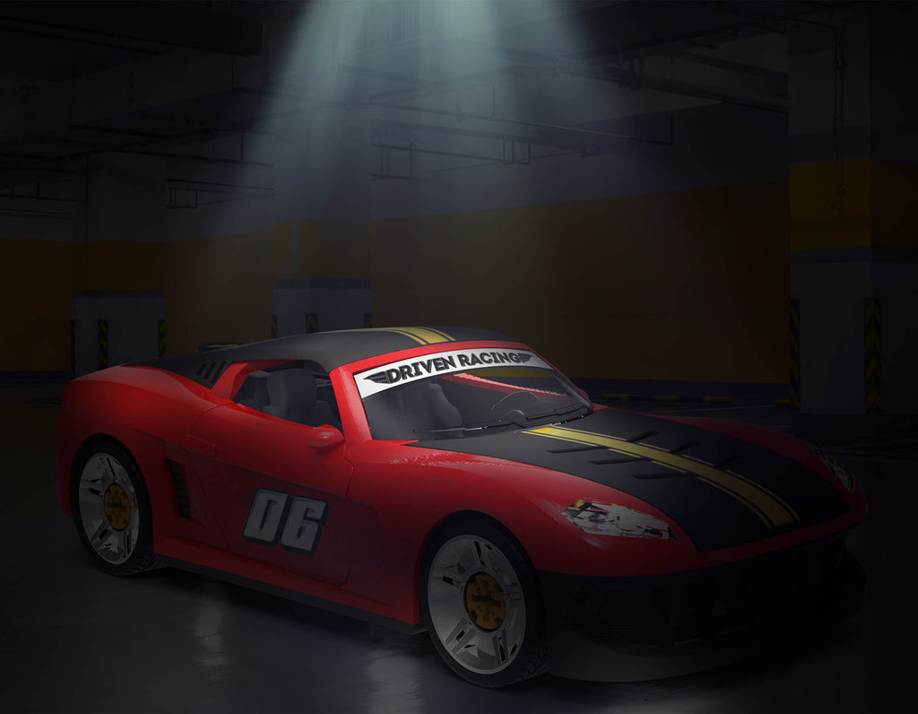 Red take-apart toy sports car with tools and stickers