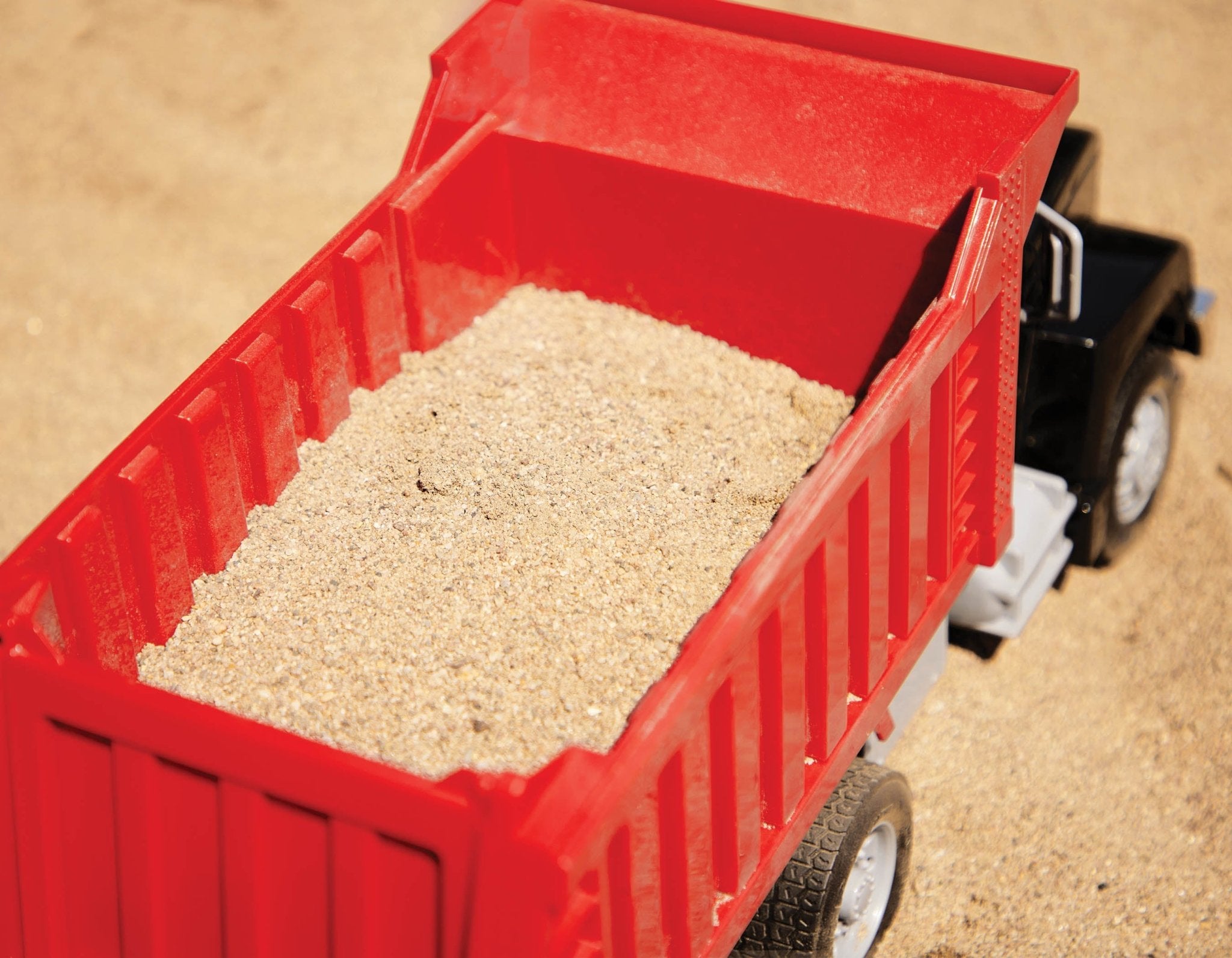 Red toy dump truck with remote control