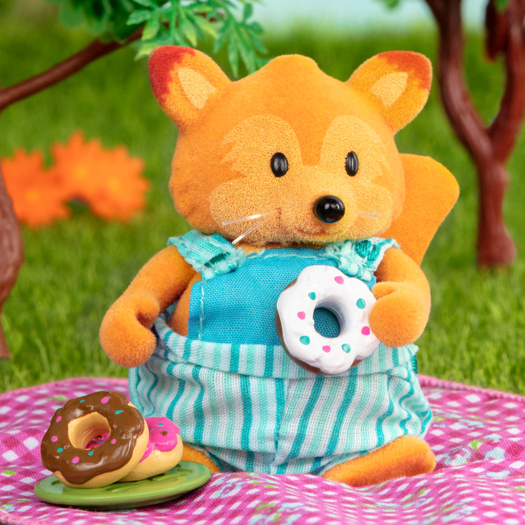 Bear figurine on picnic playset