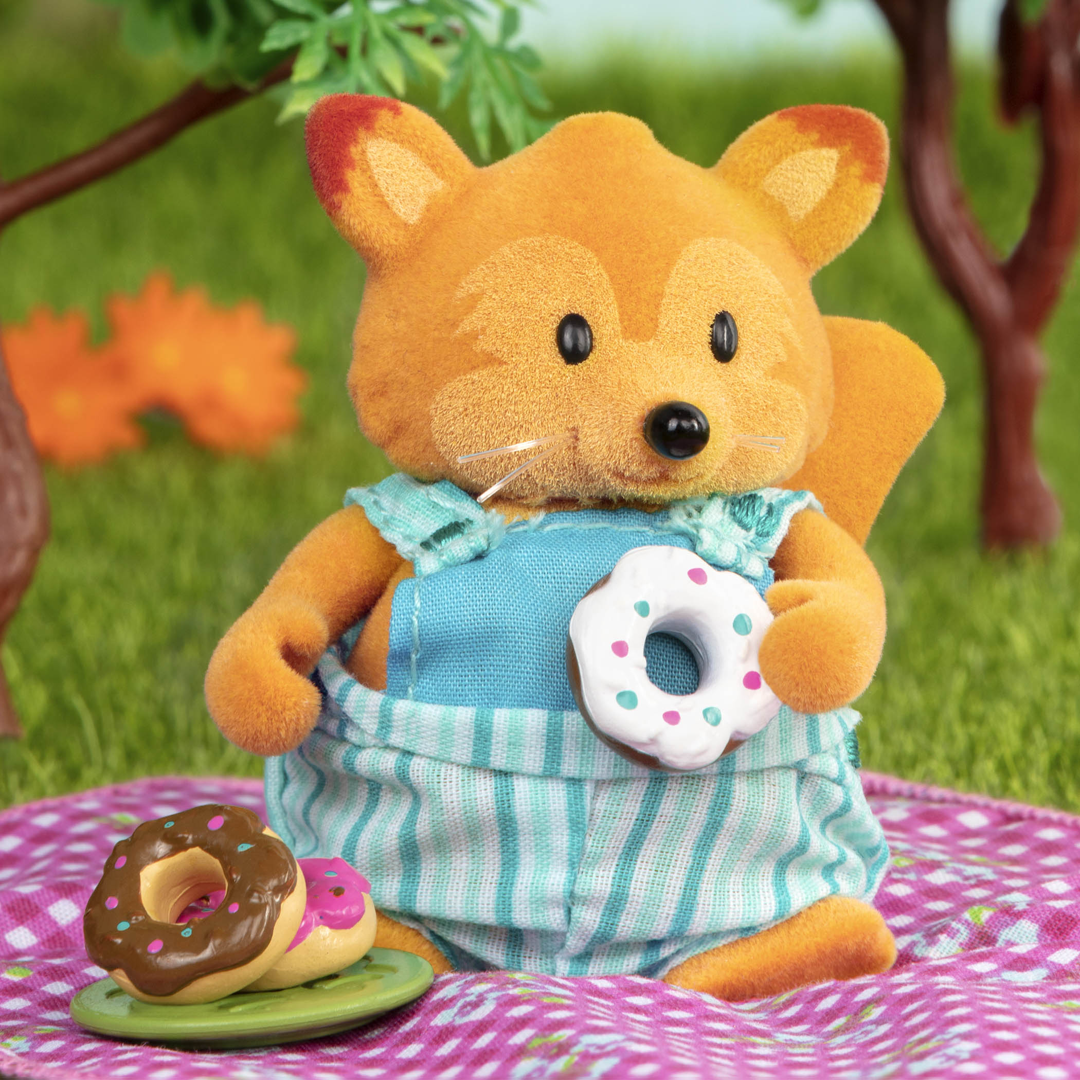 Bear figurine on picnic playset