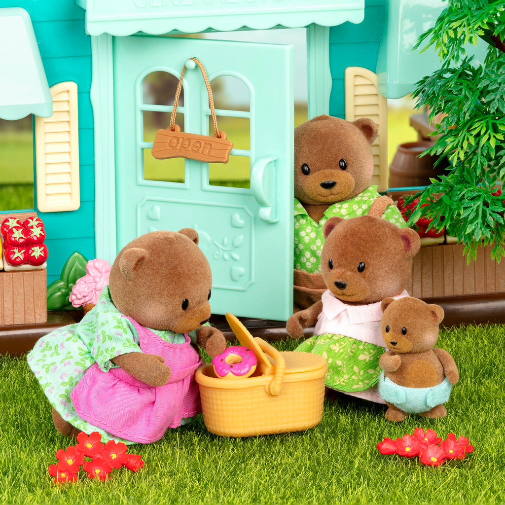 Bear figurine on picnic playset