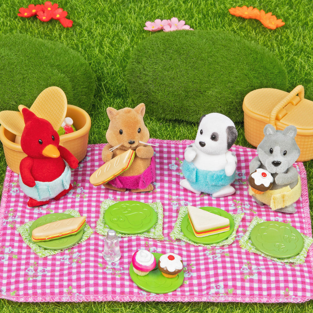 Bear figurine on picnic playset