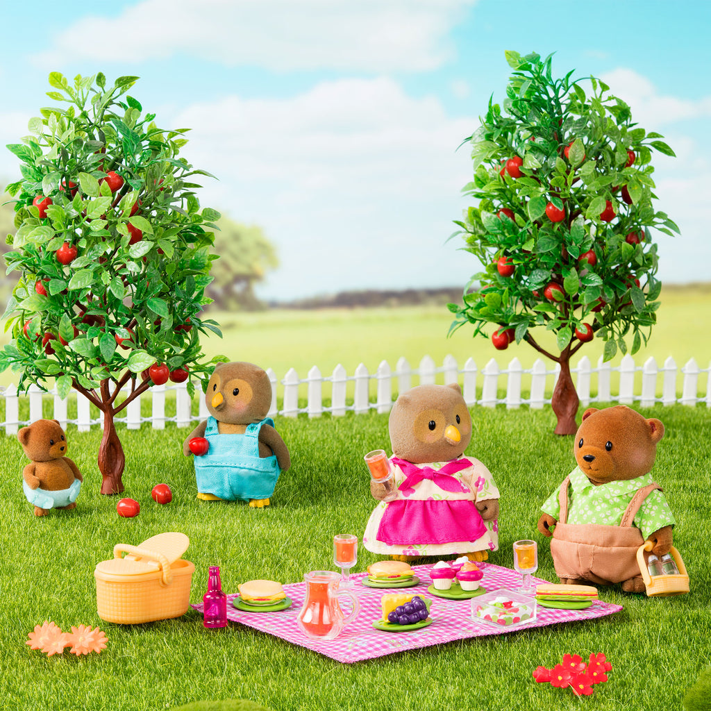 Bear figurine on picnic playset